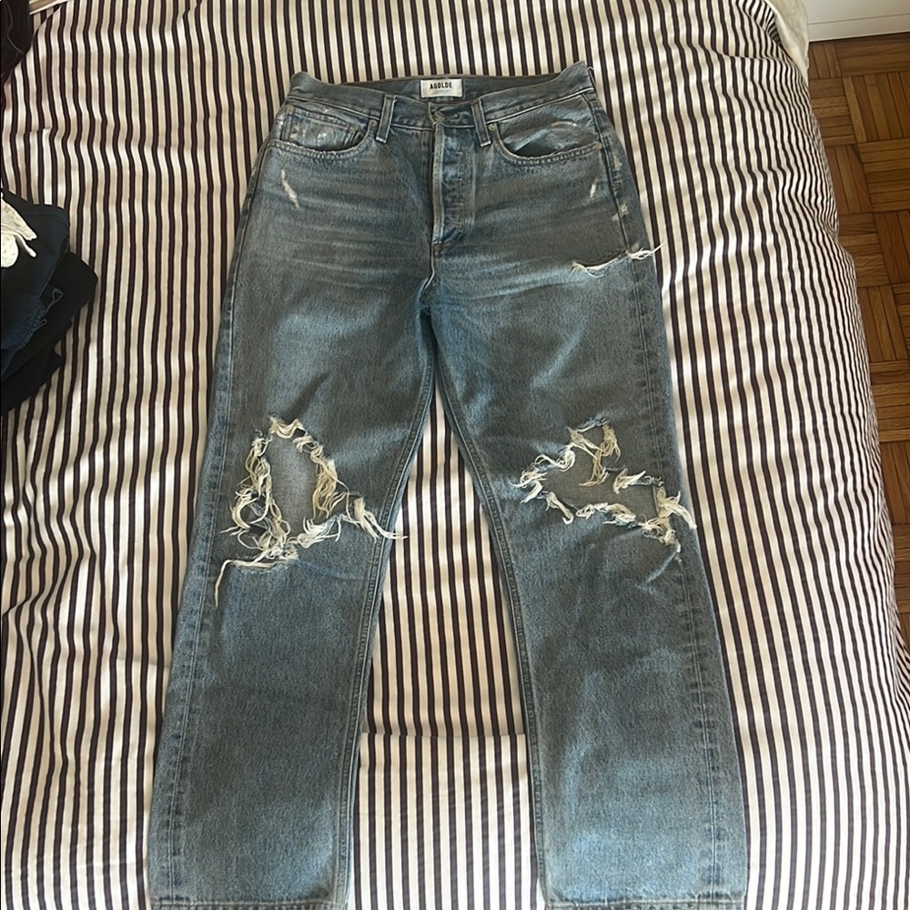 Distressed light wash Agolde jeans